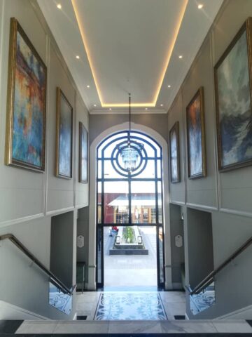Large abstract cold wax paintings by Leonie E. Brown installed in the Am Weinberg Hotel foyer, Namibia Large abstract cold wax paintings by Leonie E. Brown installed in the Am Weinberg Hotel foyer, Namibia